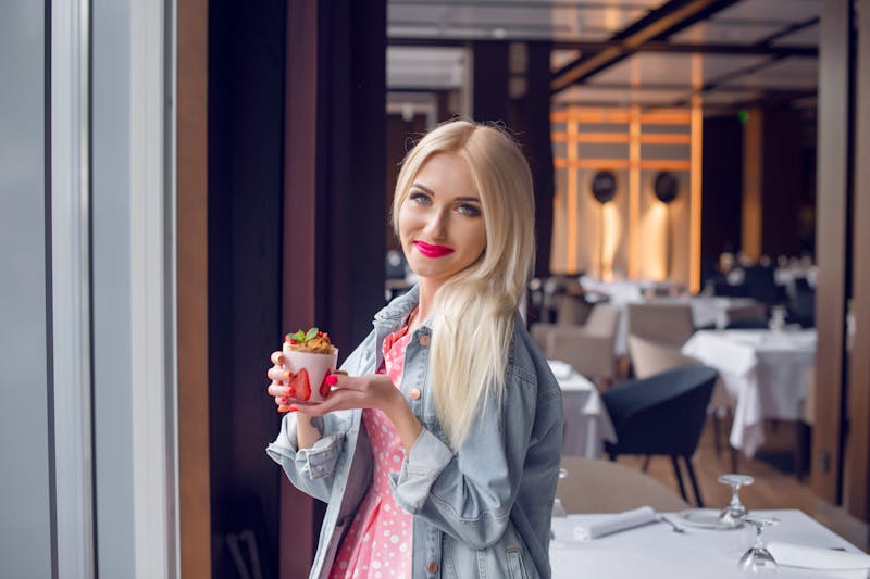 Happy Punch Pizza team member smiling at work